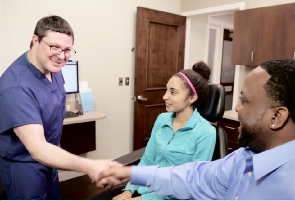 Dr. Sanker greeting patients